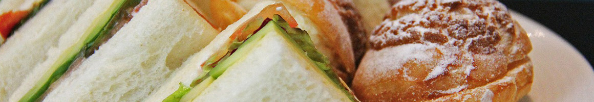 Eating Deli Sandwich at Bridgewater Village Store & Bistro restaurant in Bridgewater, CT.